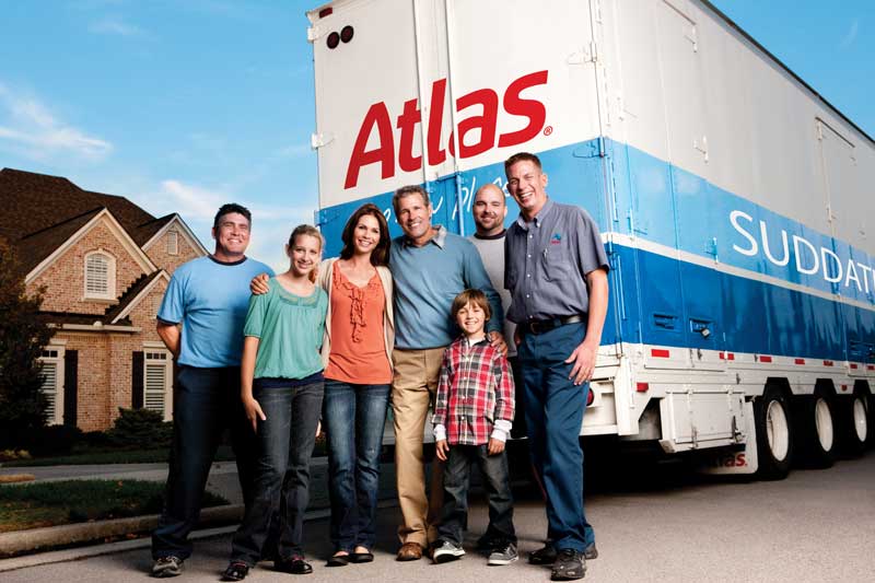 family and operator with truck